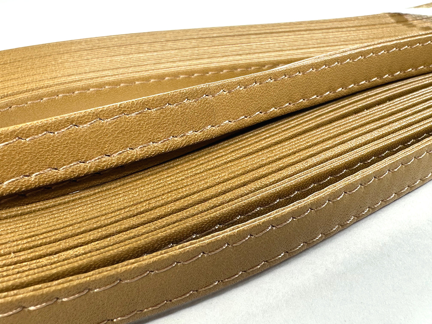 Leather double-fold tape with double stitching, 10mm, 10m random skein, K910